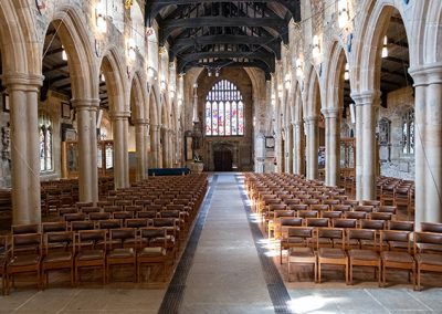 The nave filled with chairs.