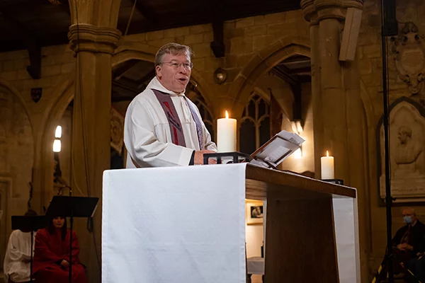 Canon Philip Gray at a service.